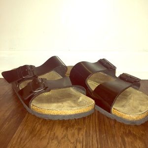 Birkenstock’s Black patent slip on